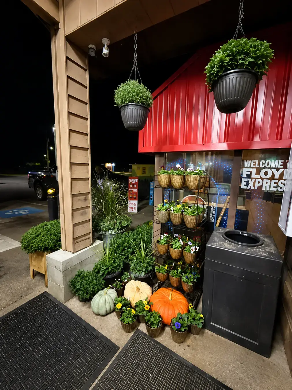 Floyd, VA convenience store exterior with decorative plants